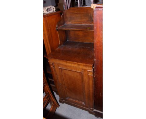 A 19th century figured and quarter cut oak side cabinet, fitted shelf over panelled door, on block base, 19" wide