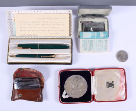 A Parker pen and pencil set, in case, a Ronson lighter, in case, a 1937 Royal Mint Coronation medal and two propelling pencil
