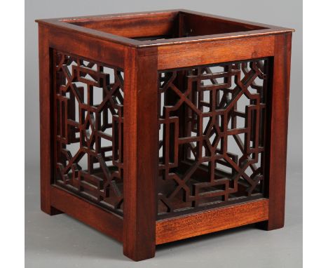 A mahogany fretwork planter of Chippendale design, 10" square