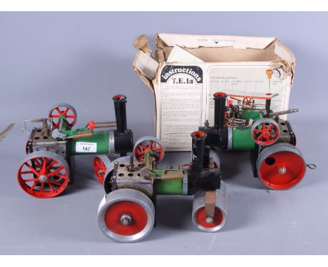 A Mamod live steam traction engine, in box, a similar unboxed, and a Mamod steam roller