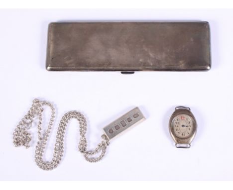 An engine turned silver cigarette case, 1935 Jubilee mark, 3.5oz troy approx, a silver ingot on chain, 1977 Jubilee mark, 1.7