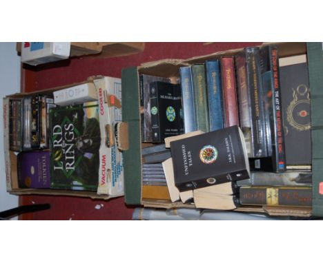 A large collection of Lord of the Rings related memorabilia and effects to include DVDs, posters, book, board games and other