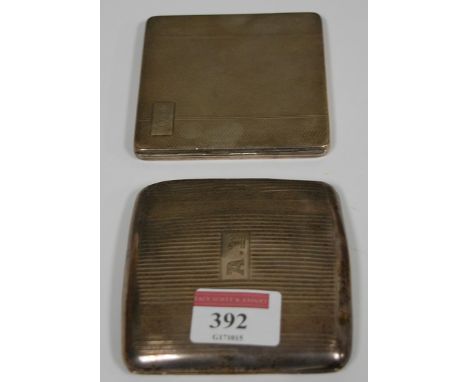 An early 20th century engine turned silver cigarette case monogrammed JGR; together with one other (2) 