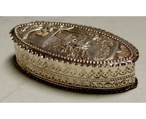 A late Victorian silver and embossed table snuff box of elliptical form, the cover depicting a figure landscape scene Conditi
