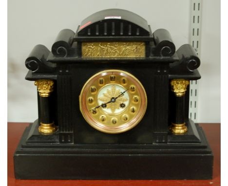 A Circa 1900 slate mantel clock with eight day French brass cylinder movement striking on a gong