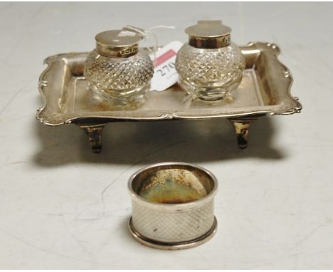 A Walker & Hall silver inkstand and a silver engine turned napkin ring (2) Condition Report / Extra Information Date 1903.
Ma