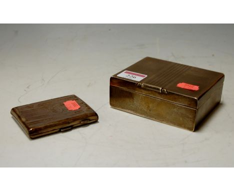 An engine turned silver table cigarette box and a silver pocket cigarette case (2) 