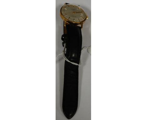 A  gents Rotary 9ct gold cased wrist watch having signed silver dial with date aperture, manual wind movement with replacemen