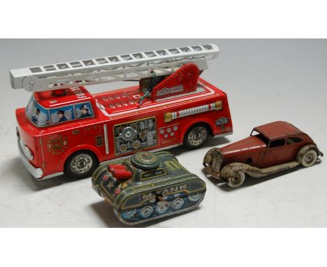 A Japanese tinplate model of a fire engine, marked SH; together with a Japanese clockwork tinplate M Tank, marked Yone; and a