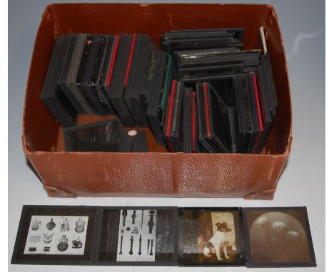 A quantity of glass projector slides