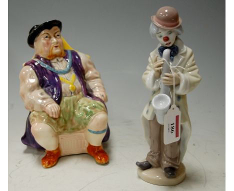 A Lladro porcelain figure No.5471; and a Melbaware character jug Henry VIII (2)