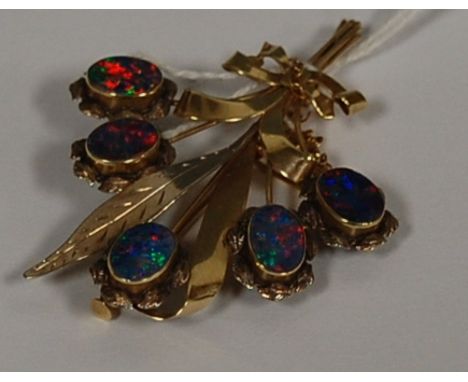 A 10ct yellow gold and opal set leaf brooch, 9g