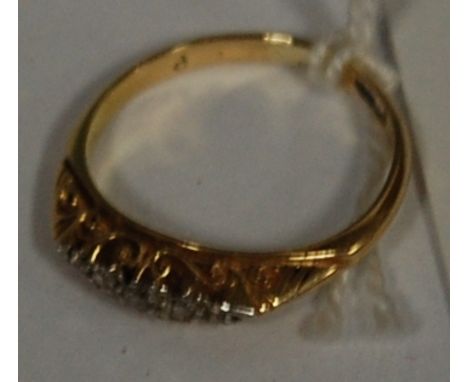 An early 20th century 18ct gold and diamond set dress ring  Condition Report / Extra Information Marks are rubbed and has bee