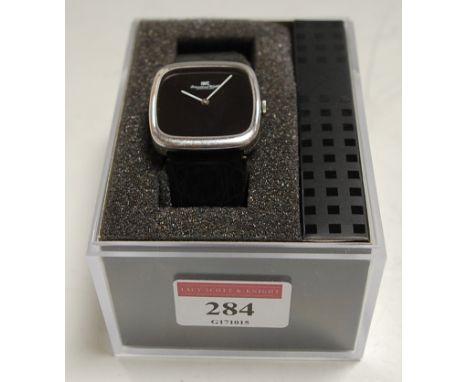 A gents IWC quartz wristwatch, with signed black dial  Condition Report / Extra Information All with mid-level crazing throug
