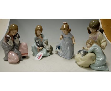 Three Lladro porcelain groups, numbered 5640, 6226 and 1534; and one other similar by Nao (4) 