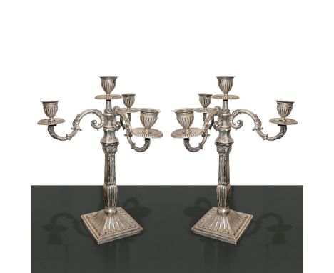 Pair of 4-light silver candlesticks H 28 cm, base 9.5x9.5 cm. Gr 974      H 28 cm, base 9.5x9.5 cm. Gr 974     