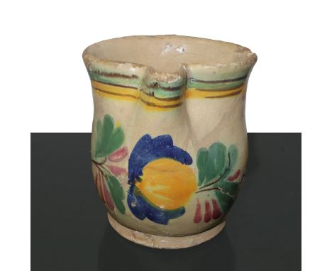 Polychrome ceramic pourer from Caltagirone, enamelled with flowers and leaves. Restored H 14.5 cm      H 14.5 cm     