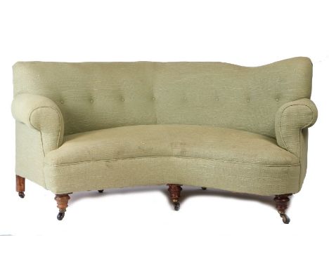 Edwardian parlour settee, upholstered in a woven green fabric, the shaped button back above a curved seat, raised on turned l