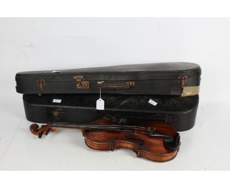 3 cased violins, one labelled "Antonius Stradivarius Cremonensis Faciebat Anno 1713", another labelled "Joan. Carol. Kloz, in