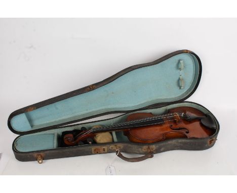 A cased violin labelled "Wright ar ye Harp on London Bridge 1738", two piece back, measuring 60cm.