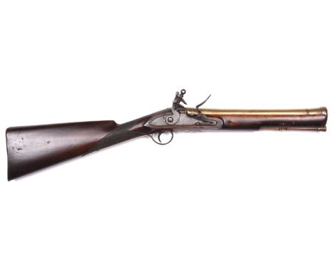 A late 18th century brass barrelled flintlock blunderbuss, 27" overall, slightly swamped bell mouth barrel 12" with Tower pri