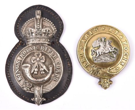 A post 1902 white metal martingale badge of the King's Royal Rifle Corps, with leather backing; and an ear boss of the Northu