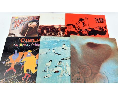 35+ 12" vinyl records of mainly 1970s/80s mainstream rock and pop including: Dire Straits; Walk of Life. Elton John; Don't Sh