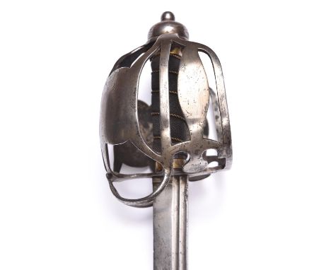A mid 18th century British cavalry basket hilted backsword, straight single edged blade 34" with two narrow fullers, the ricc