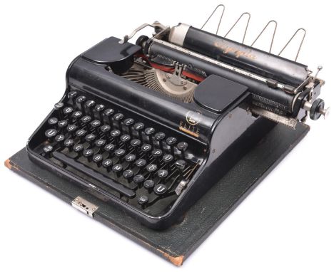 A 1940s Olympia portable typewriter made for the German market, with lid and carrying handle. Basically GC (worn). £30-50 