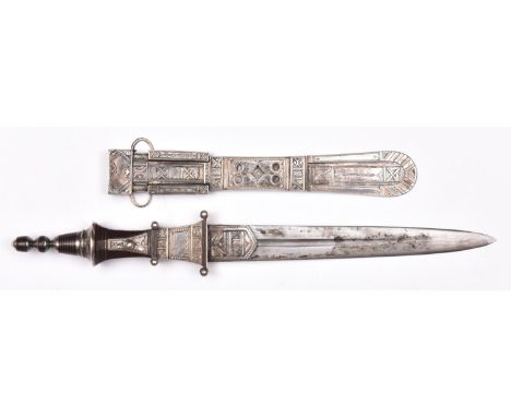 A North African knife, tapered double edged blade 7½" with central fullers, in its sheath, the sheath and most of the hilt co