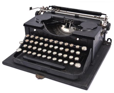 A 1930s Royal portable typewriter. In black finish with a cloth covered wooden case. QGC-GC for age, cleaning and possible re