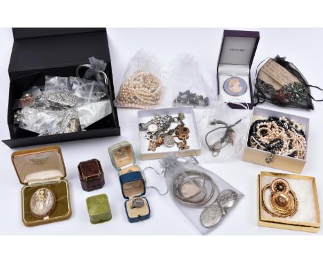 A collection of costume jewellery, silver bangles, silver watch case, etc. 2x Mourning brooches. 8 carat gold (335) cygnet ri