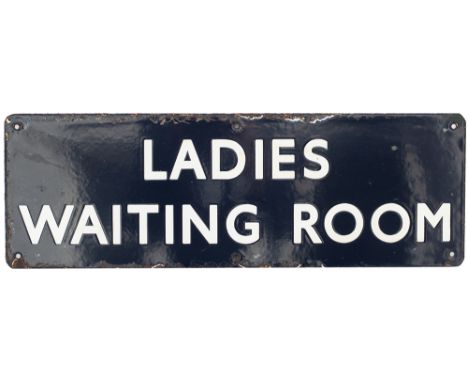 BR(E) Ladies Waiting Room BR(E) enamel doorplate LADIES WAITING ROOM measuring 18in x 6in. In good condition with minor edge 