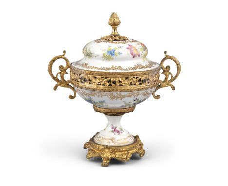 A DRESDEN PORCELAIN AND GILT METAL MOUNTED URN AND COVER, 19th Century, surmounted with acorn finial, the body painted with c