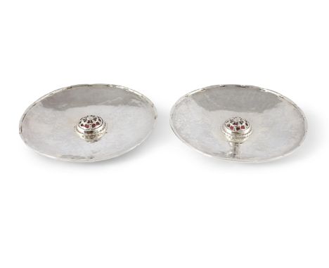 A PAIR OF ARTS AND CRAFTS SILVER AND ENAMEL DISHES by Omar Ramsden, London 1936, each of shallow circular form with notched r