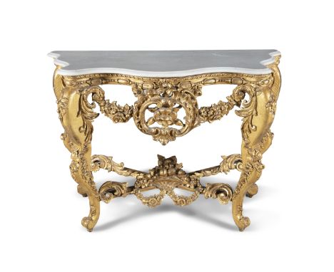 A 19TH CENTURY GILTWOOD, PLASTER AND GESSO SERPENTINE FRONT CONSOLE TABLE, with white marble top, moulded rim above foliate s