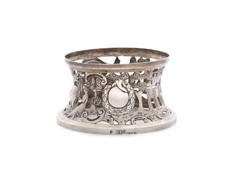 A SMALL IRISH SILVER DISH RING, Dublin 1917, mark of Sharman D Neill, the pierced body with vacant crest reserves surrounded 