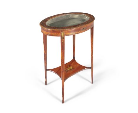 A GEORGE III STYLE PAINTED SATINWOOD OVAL CURIO TABLE, with glazed top, decorated with garlands of ribbons, pearls and bellfl