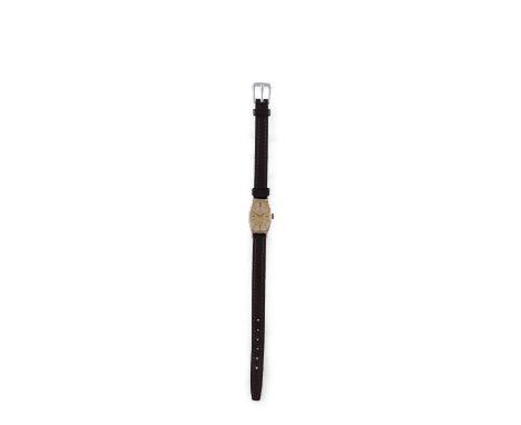 A LADIES WRISTWATCH, BY OMEGA, of manual wind movement, the tonneau shape champagne dial with baton hour markers and black ha