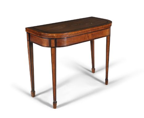 A HAREWOOD AND MARQUETRY INLAID FOLD-TOP CARD TABLE, C.1790, the crossbanded top with rounded fore-corners, inlaid with centr