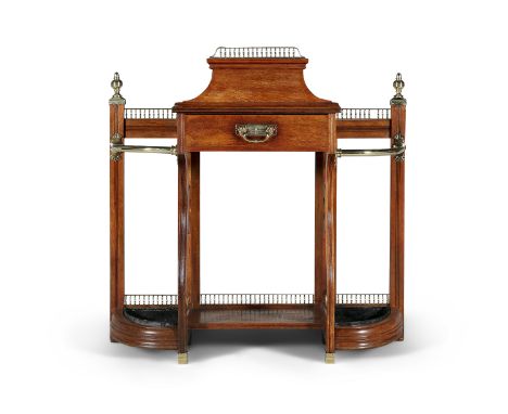 A VICTORIAN MAHOGANY BRASS MOUNTED STICK STAND, attributed to James Shoolbred &amp; Co., with single frieze drawer, 102 cm x 