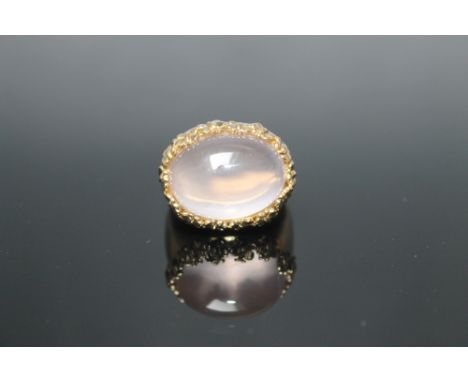 A LARGE CABOCHON ROSE QUARTZ RING, the Rose quartz measuring approx 20 mm by 15 mm, ring size P