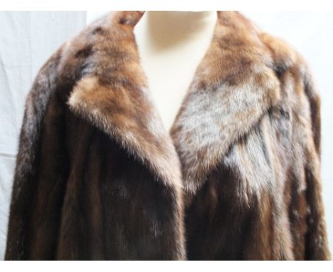 A LADIES VINTAGE MID-LENGTH MINK FUR COAT, fully lined, labelled 'Faulkes of Birmingham' front pockets, hook fastenersConditi