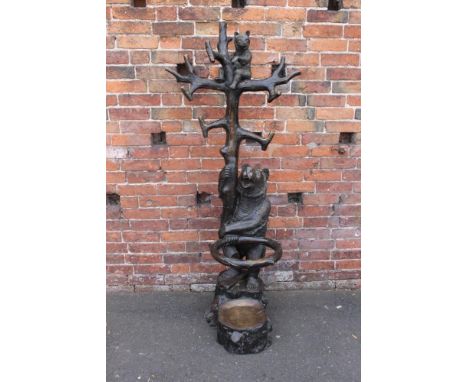 AN IMPRESSIVE BRONZED CAST BLACK FOREST STYLE BEAR STICK STAND, the stand of naturalistic form with five spiked branches, a l