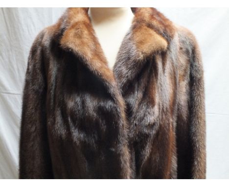A LADIES VINTAGE MAHOGANY BROWN FUR JACKET, fully lined with internal ties, labelled Faulkes of BirminghamCondition Report:No