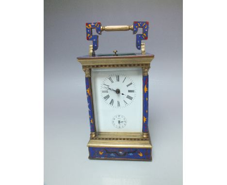 A BRASS AND CLOISONNE CASED REPEATER CARRIAGE CLOCK, the case with four pillars, white enamel face with Roman numerals and ou