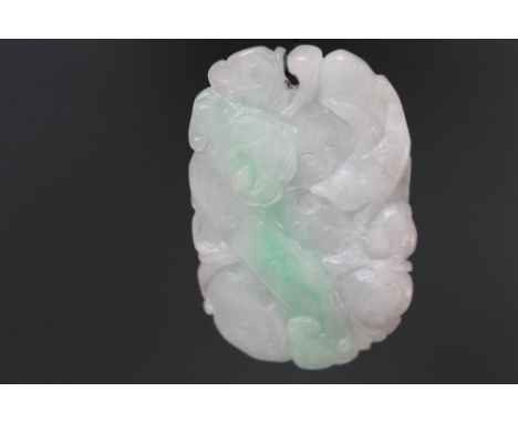 A CARVED JADE TABLET, H 7 cm W 4.25 cm