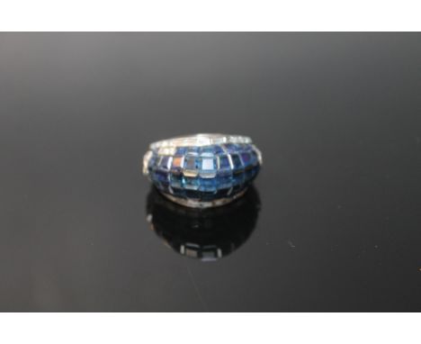 A SAPPHIRE AND DIAMOND RING, set with approx 7 carats of sapphires and 1 carat of diamonds, ring size N  