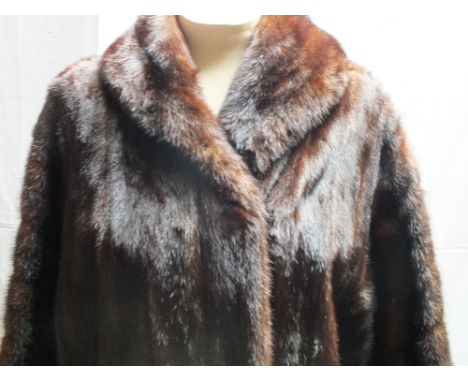 A LADIES VINTAGE LONG LENGTH FUR COAT, fully lined with internal ties, labelled 'Faulkes of Birmingham' front pockets, hook f