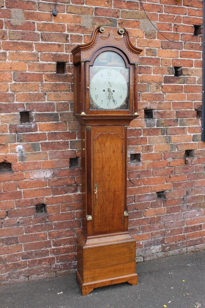 A 19TH CENTURY OAK EIGHT DAY LONGCASE CLOCK BY WILLIAM ARIS OF
